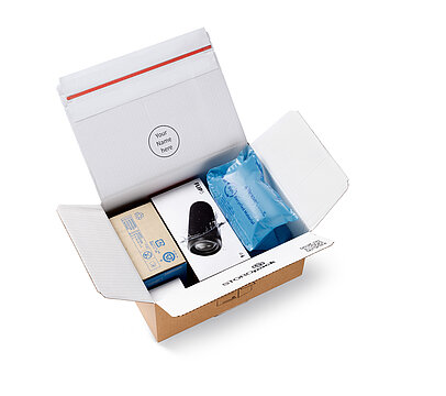 
			Open cardboard box with protective air cushions