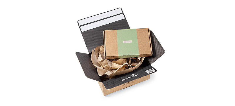 Shipping box with paper cushioning