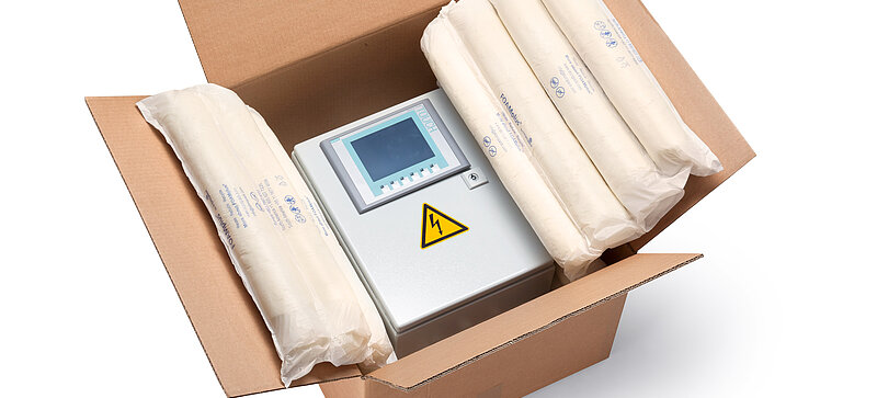 
		  A cardboard box containing an electrical enclosure and foam packaging