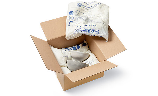 Two bowls are protected inside a box with FOAMplus Mini foam cushions