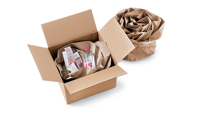 Cardboard box with paper cushioning