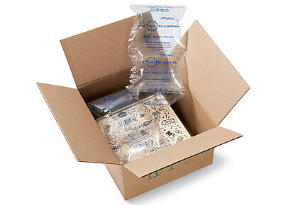 
			A cardboard box with a box and 100% RECYCLED air cushions