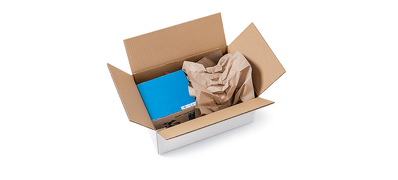Paper cushioning in a shipping box.